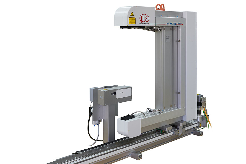 C-frame system for thickness measurements